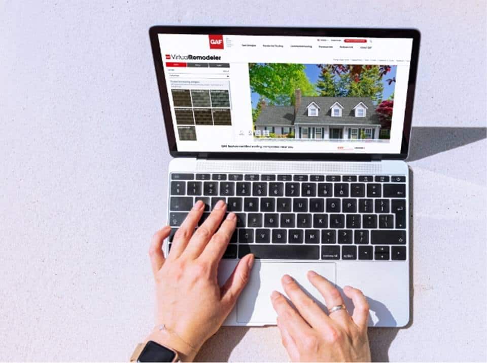 homeowner using the virtual home remodeler tool on gaf.com